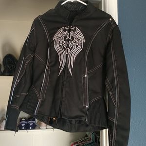 Woman's medium biker jacket.  Never worn!